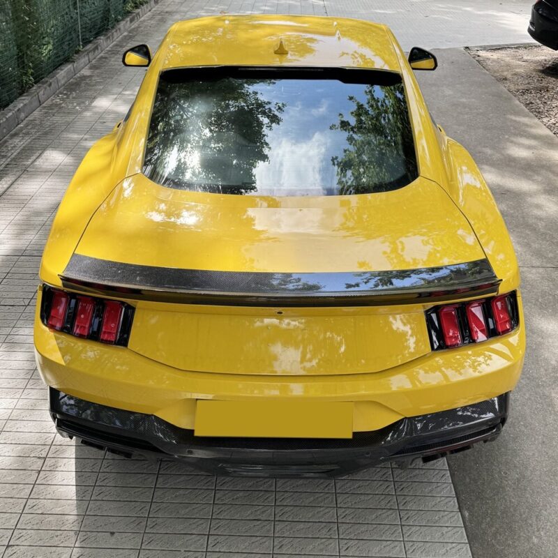 Carbon fiber spoiler on Ford Mustang Dark Horse S650 highlighting performance styling and lightweight construction