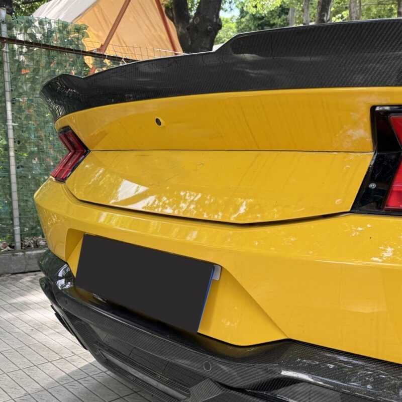 Close-up of carbon rear spoiler on Ford Mustang S650 Dark Horse for improved downforce and sporty look