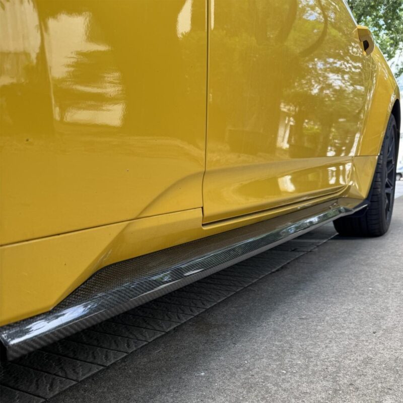 Ford Mustang S650 equipped with lightweight carbon fiber side skirts for sporty appearance and airflow enhancement